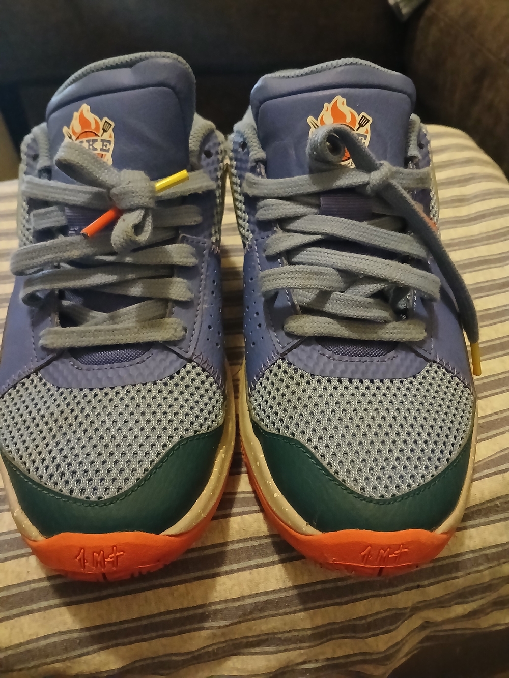 Nike Kids Blue Sneakers with Green and Orange Accents